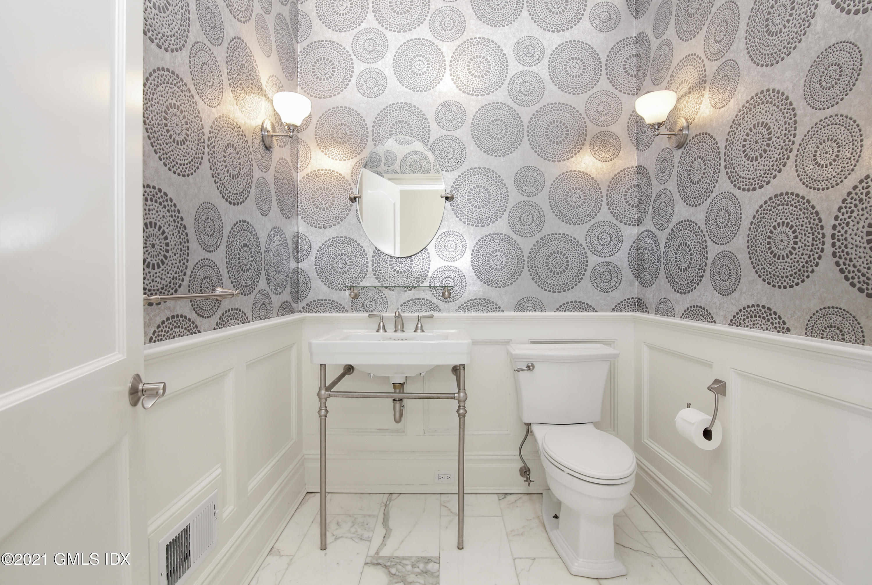 245 Bedford Road Greenwich, CT 06831 - Photo 15 of 27 a bathroom with a toilet and a sink