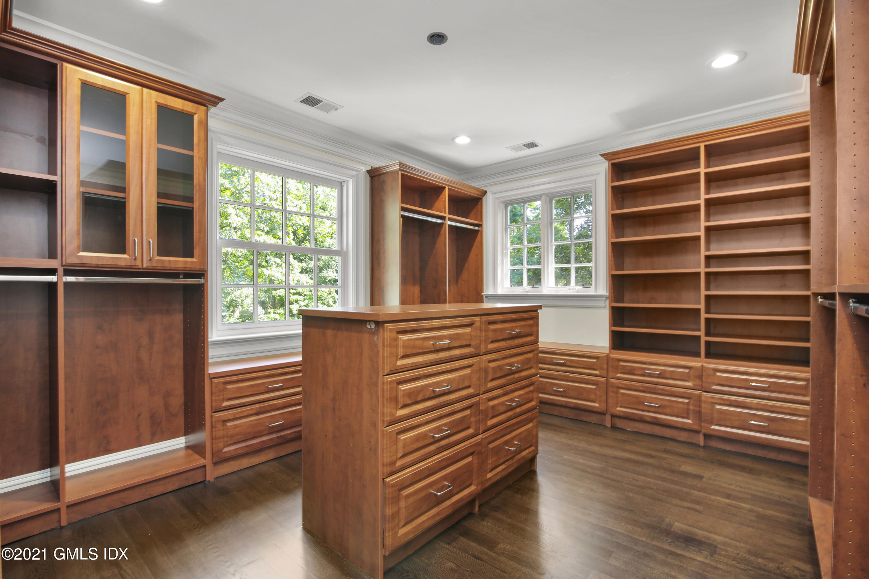 245 Bedford Road Greenwich, CT 06831 - Photo 17 of 27 a view of an empty room with a window and wooden floor