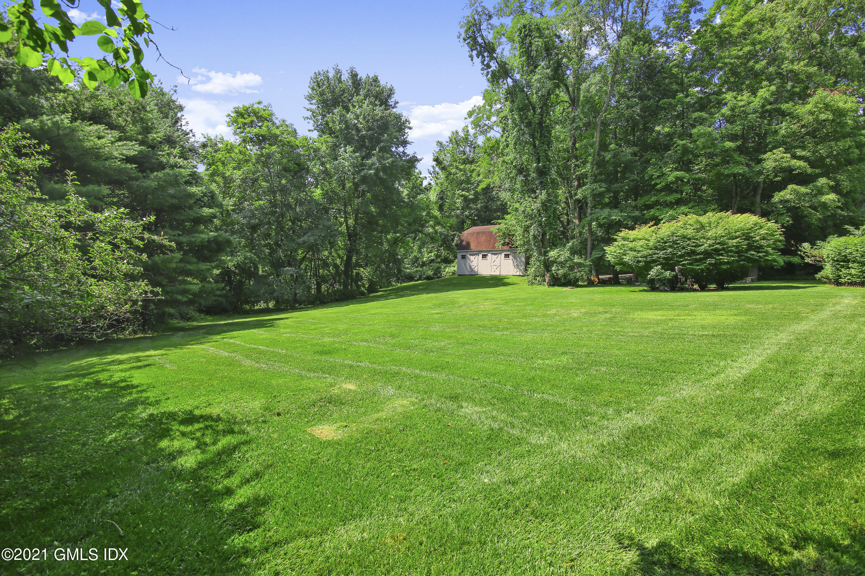 245 Bedford Road Greenwich, CT 06831 - Photo 25 of 27 a view of a back yard