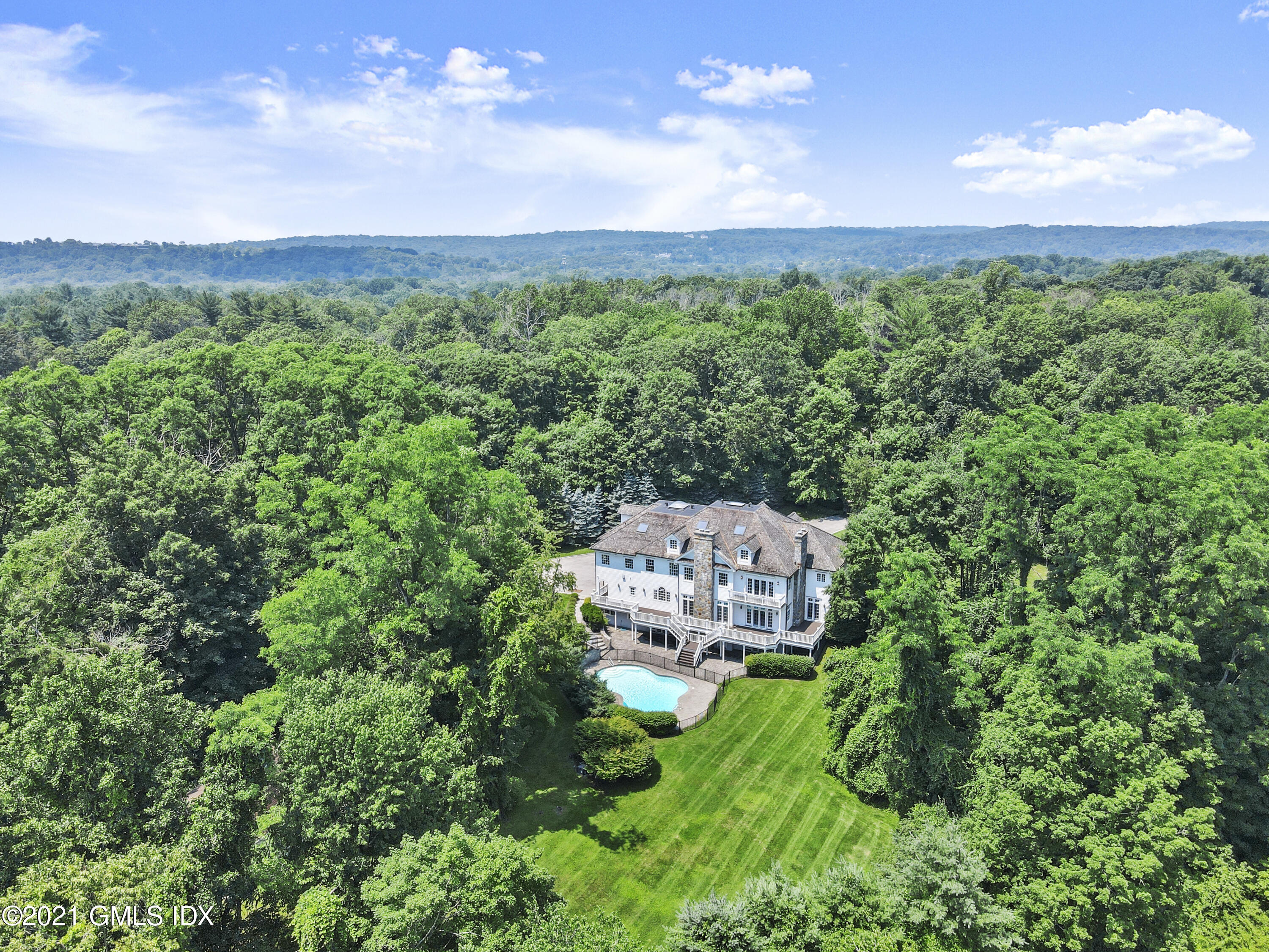 245 Bedford Road Greenwich, CT 06831 - Photo 26 of 27 a view of a lush green field