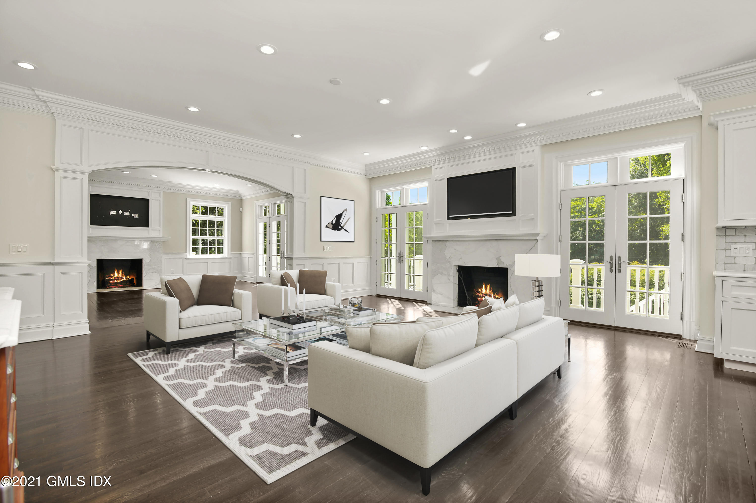 245 Bedford Road Greenwich, CT 06831 - Photo 7 of 27 a living room with furniture fireplace and flat screen tv