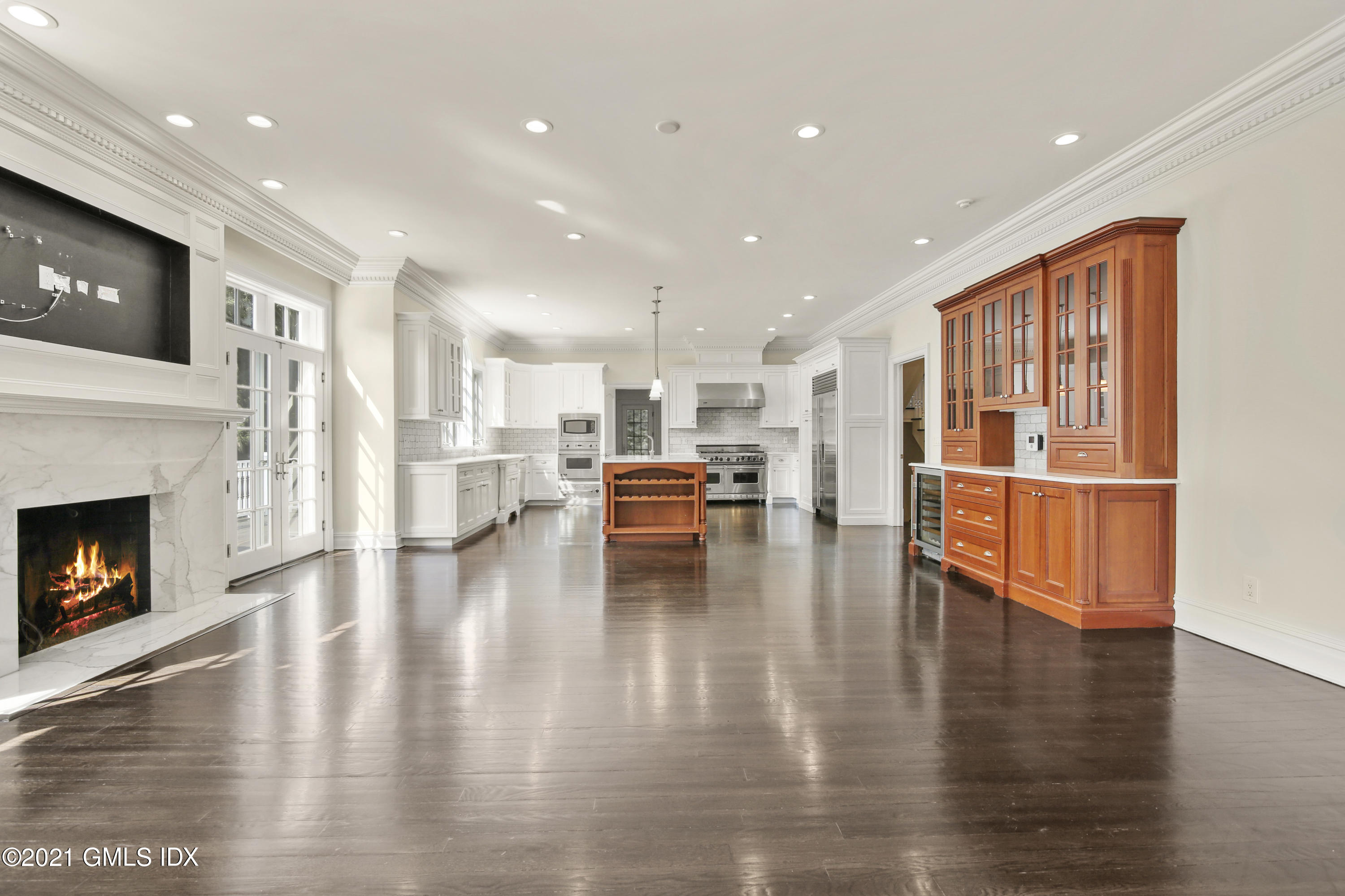 245 Bedford Road Greenwich, CT 06831 - Photo 8 of 27 a view of kitchen with furniture and wooden floor