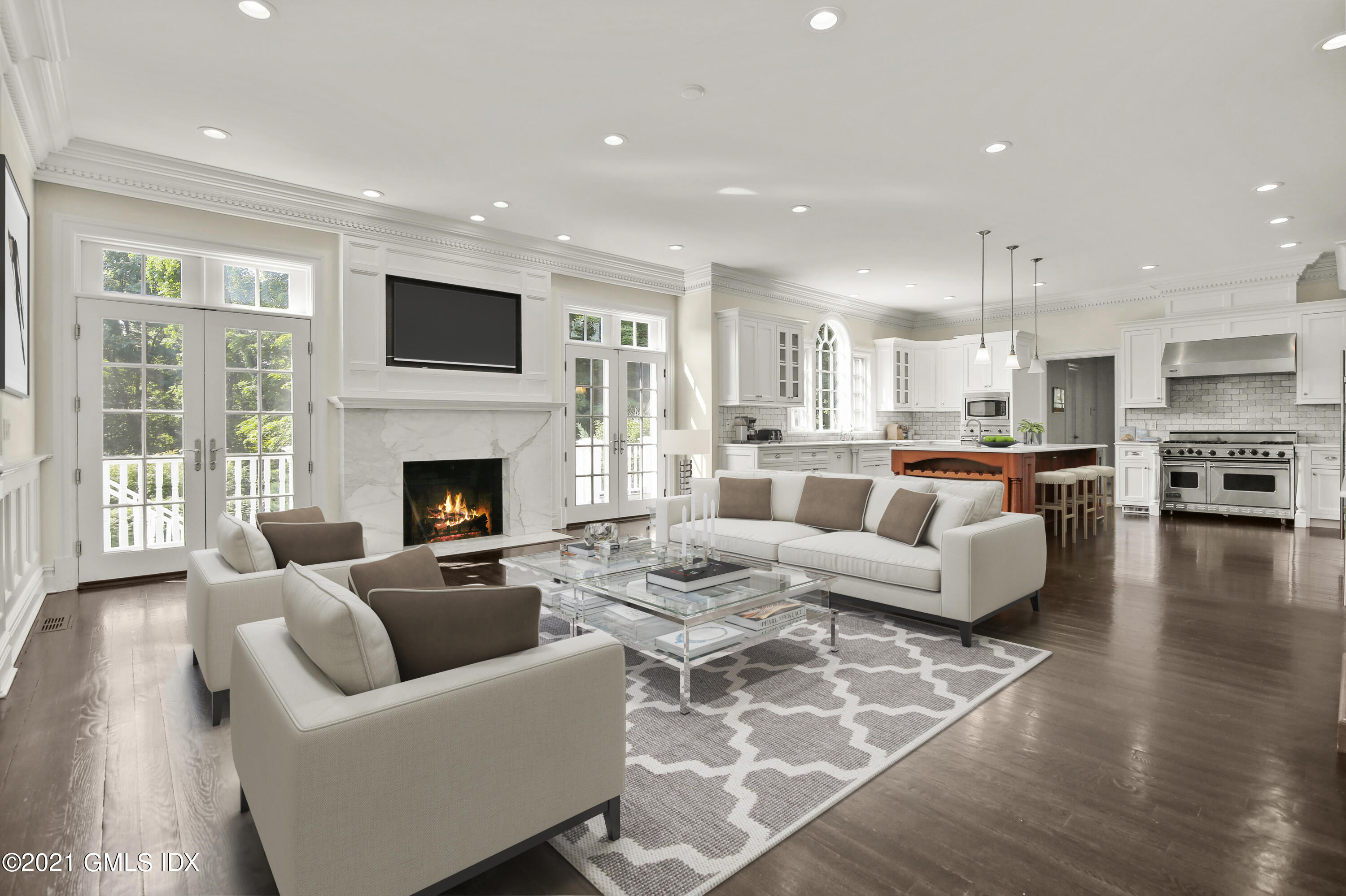 245 Bedford Road Greenwich, CT 06831 - Photo 9 of 27 a living room with furniture fireplace and flat screen tv
