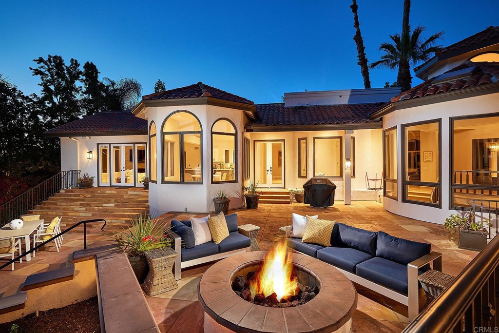 17356 Circa Oriente Rancho Santa Fe, CA 92067 - Photo 1 of 29 a outdoor living with seating space