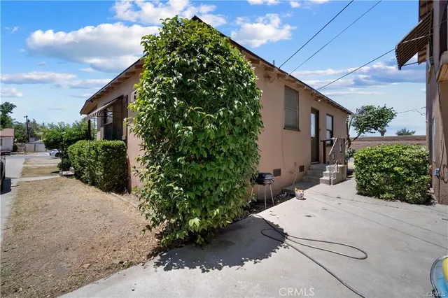 a backyard of a house with lots of green space