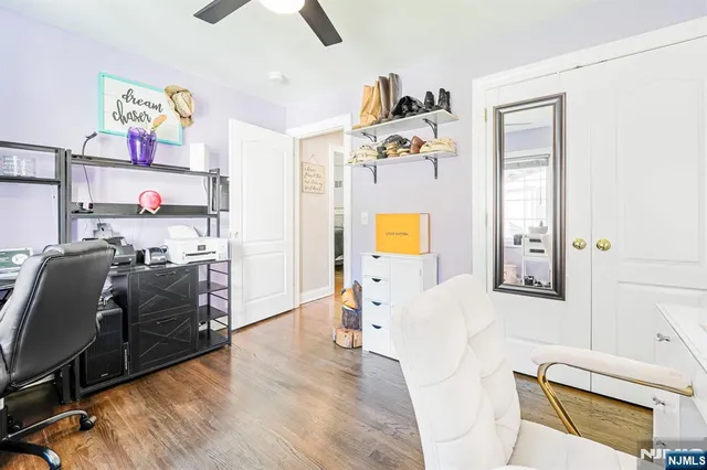 a bedroom with a bed and furniture