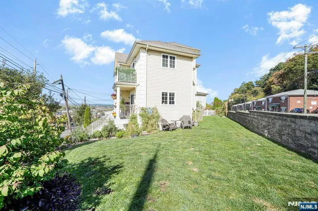 a house view with garden space