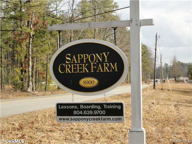 8613 Beaver Bridge Road Moseley, VA 23120 - Photo 3 of 3 a sign that is on the side of a building