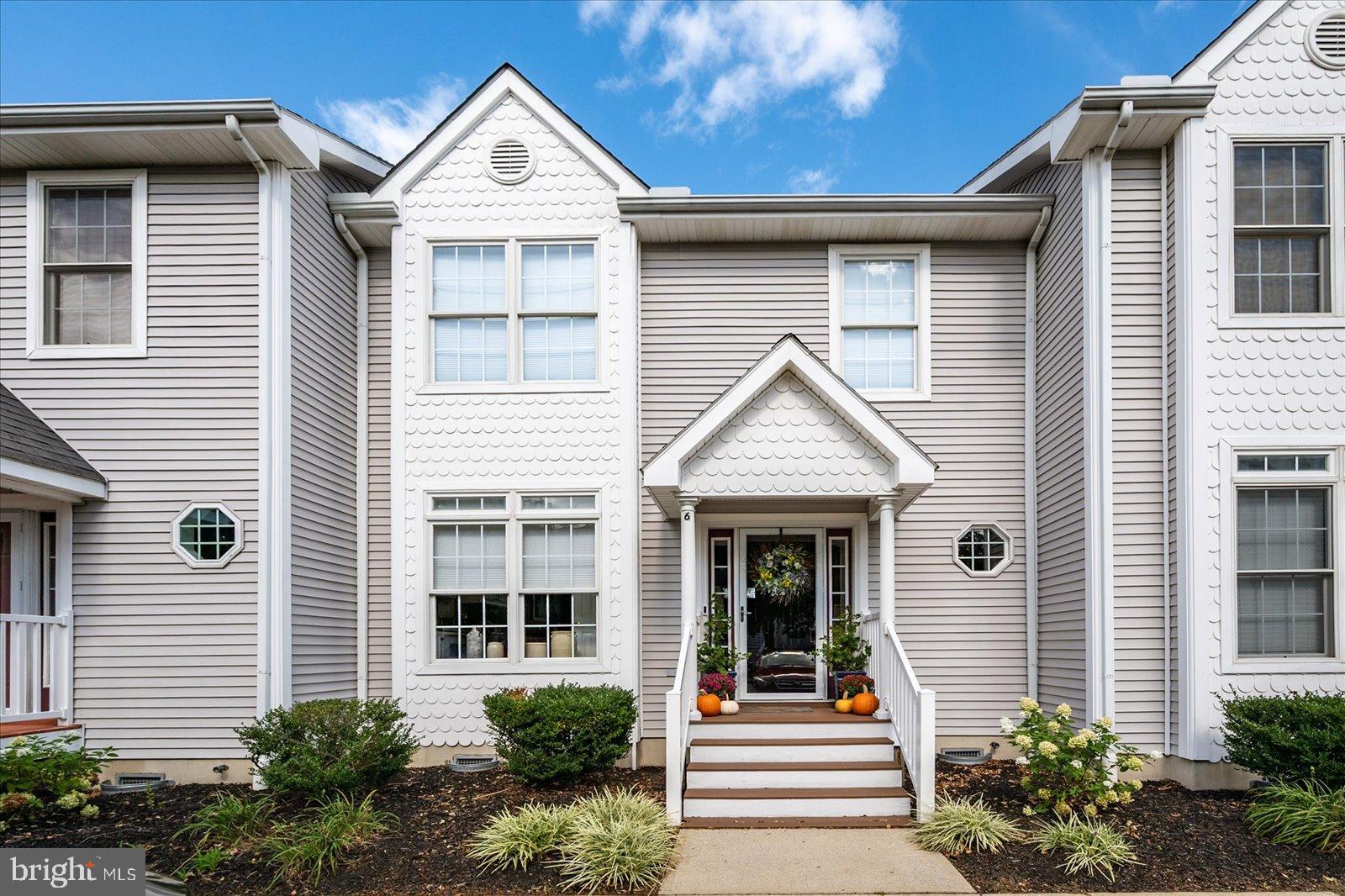 10050 Golf Course Road, Unit 6 Ocean City, MD 21842 - Photo 1 of 60 Charming facade with inviting entryway.