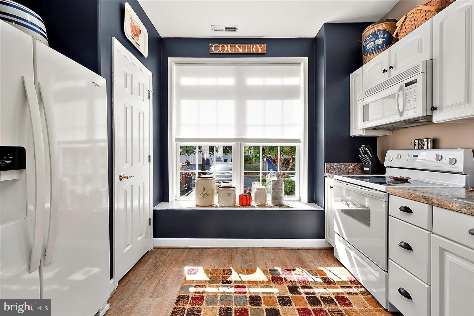 10050 Golf Course Road, Unit 6 Ocean City, MD 21842 - Photo 13 of 60 Charming kitchen with country flair.