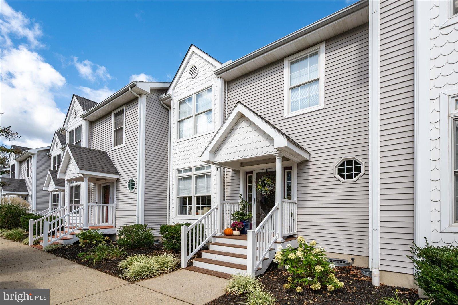 10050 Golf Course Road, Unit 6 Ocean City, MD 21842 - Photo 2 of 60 Charming townhouse with inviting entryway.