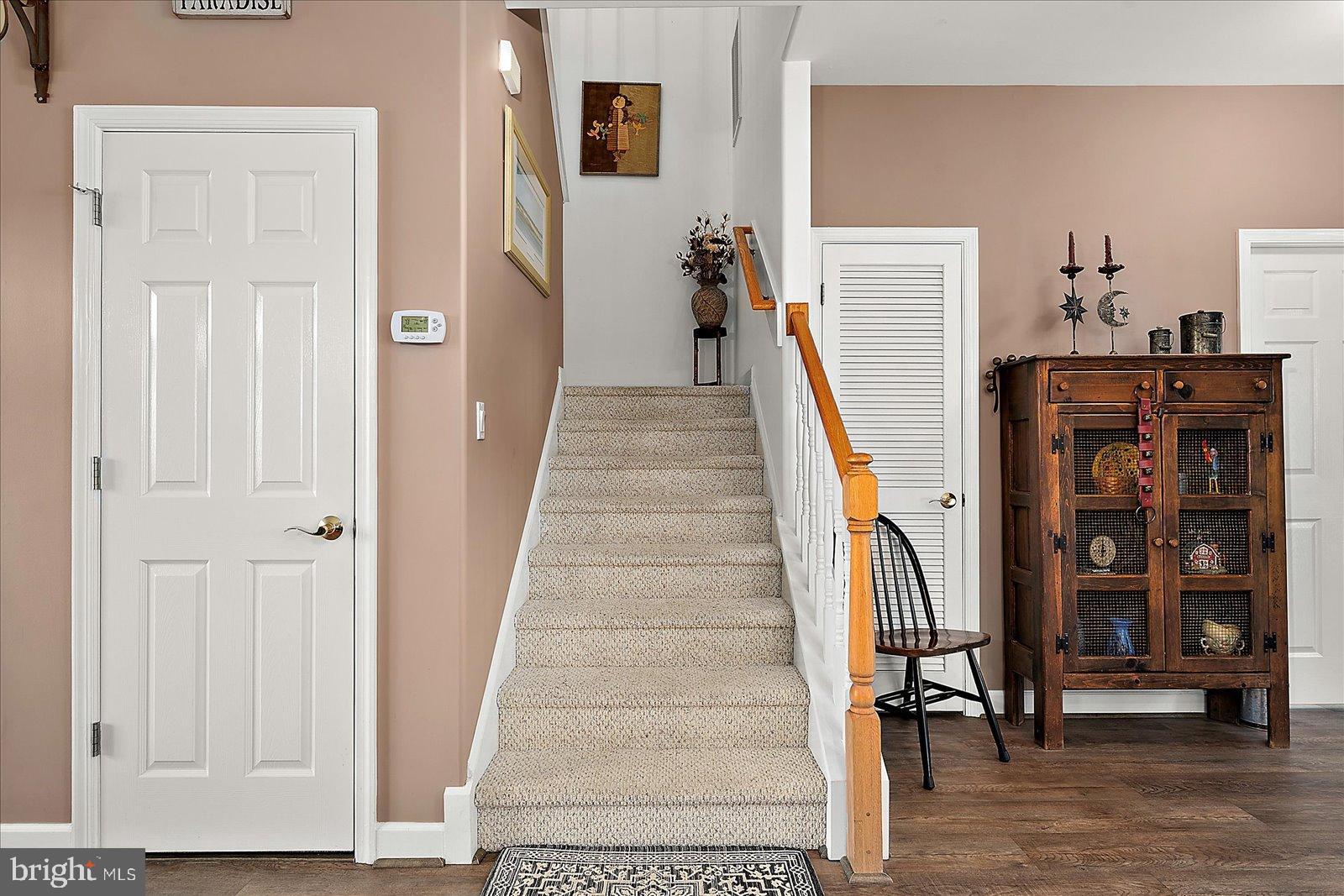 10050 Golf Course Road, Unit 6 Ocean City, MD 21842 - Photo 24 of 60 Inviting entryway with charming staircase.