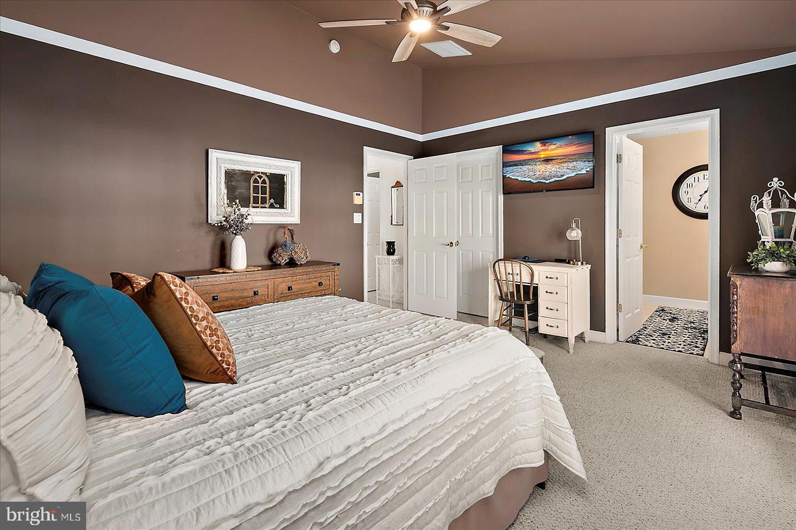 10050 Golf Course Road, Unit 6 Ocean City, MD 21842 - Photo 29 of 60 Serene bedroom with rich, warm tones.