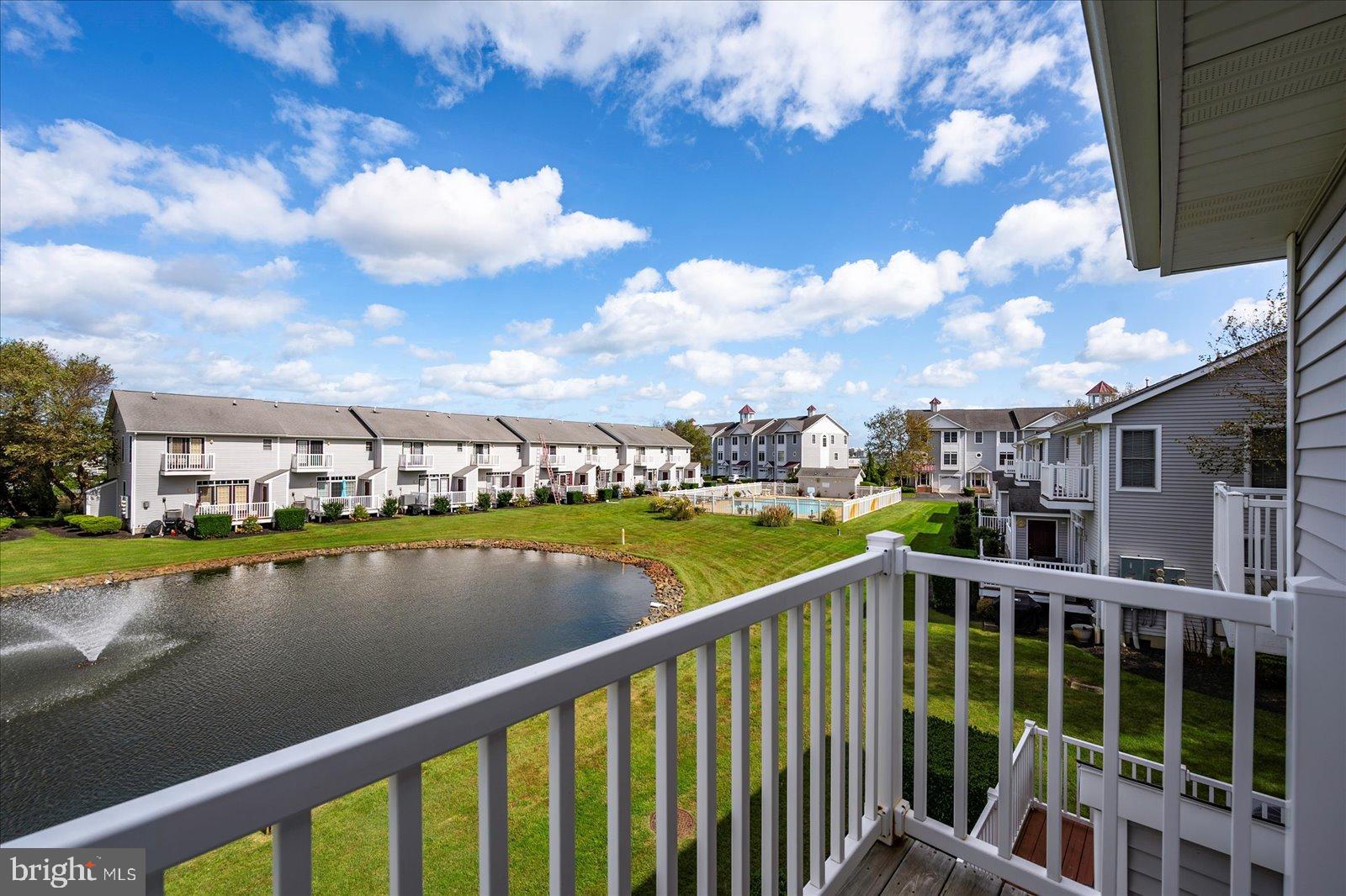 10050 Golf Course Road, Unit 6 Ocean City, MD 21842 - Photo 39 of 60 Serene lakeside view from a charming balcony.