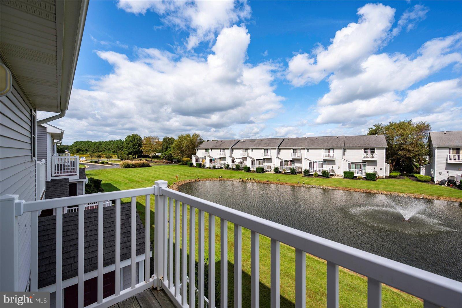 10050 Golf Course Road, Unit 6 Ocean City, MD 21842 - Photo 40 of 60 Serene lakeside view from a charming balcony.