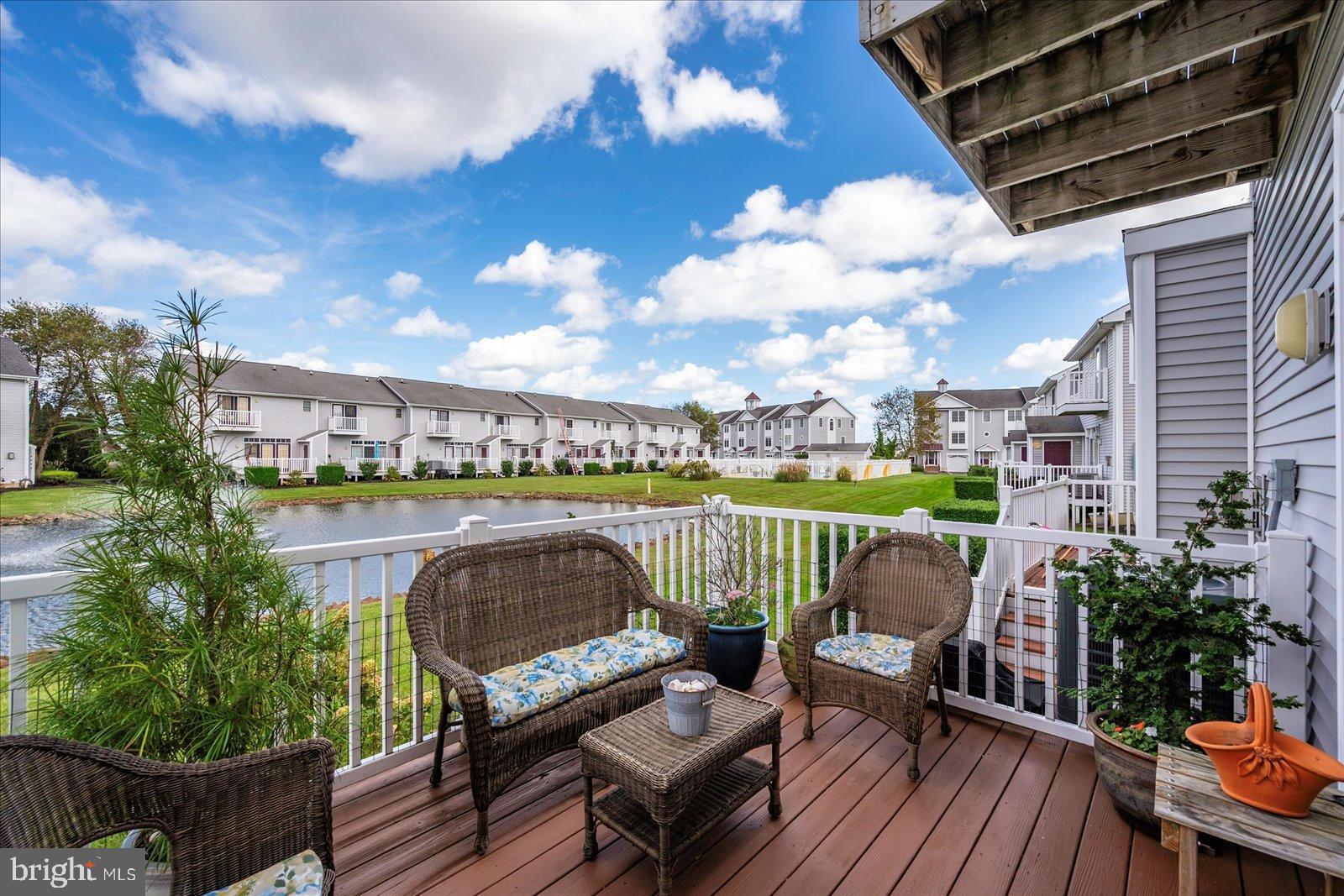 10050 Golf Course Road, Unit 6 Ocean City, MD 21842 - Photo 44 of 60 Serene lakeside retreat with scenic views.