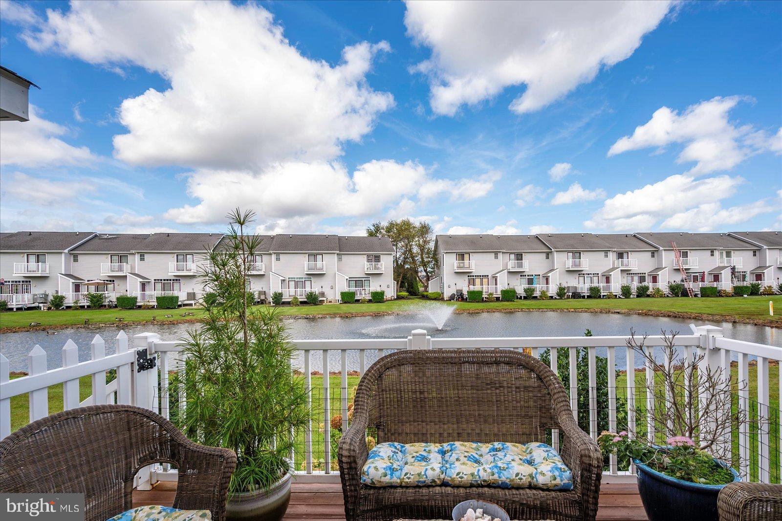 10050 Golf Course Road, Unit 6 Ocean City, MD 21842 - Photo 45 of 60 Serene waterfront view from a cozy patio.