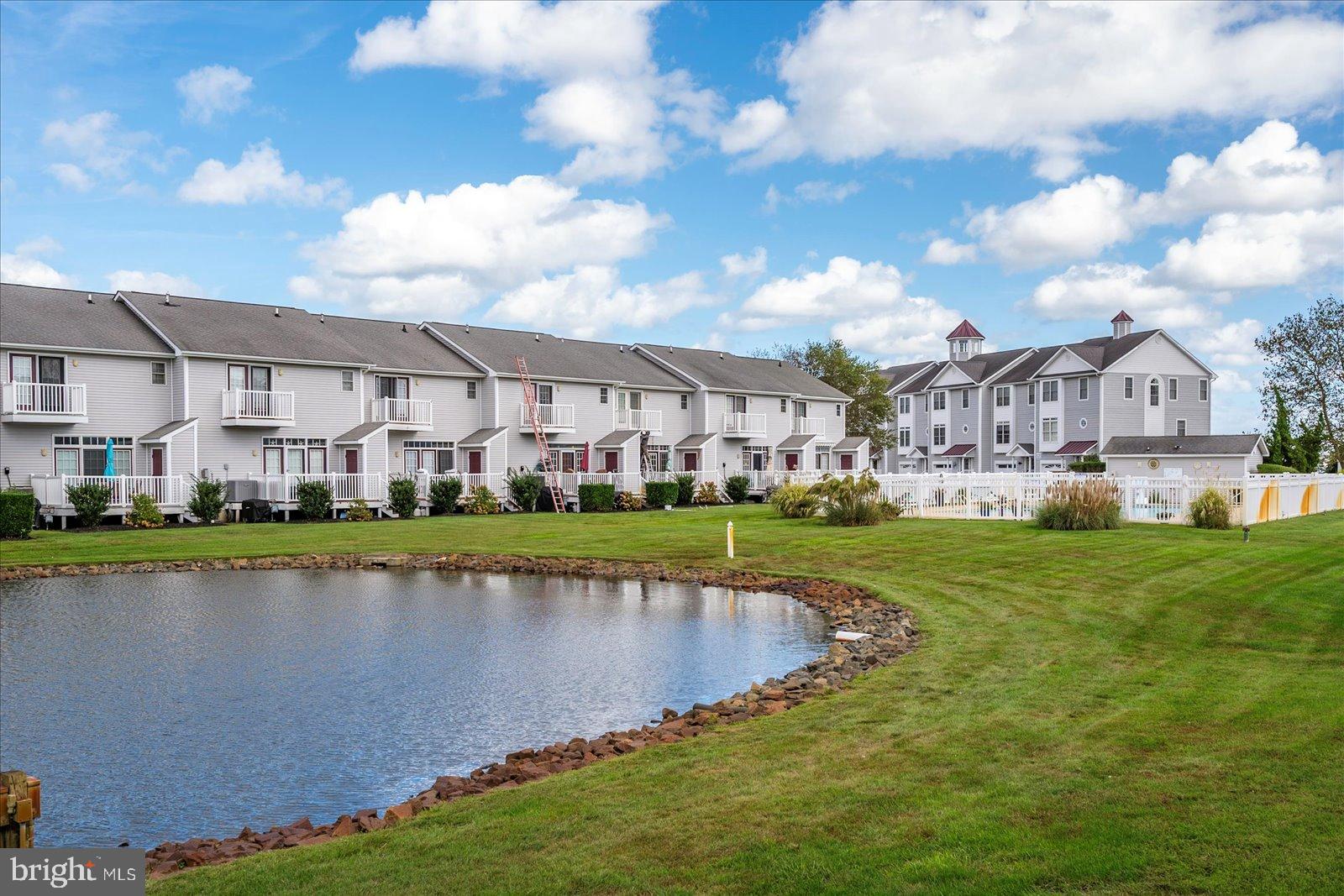 10050 Golf Course Road, Unit 6 Ocean City, MD 21842 - Photo 48 of 60 Charming homes by a serene pond.
