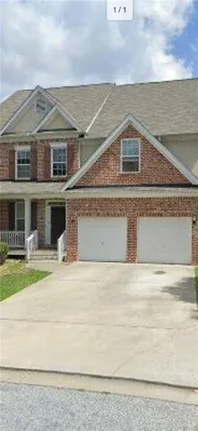 front view of house with a yard