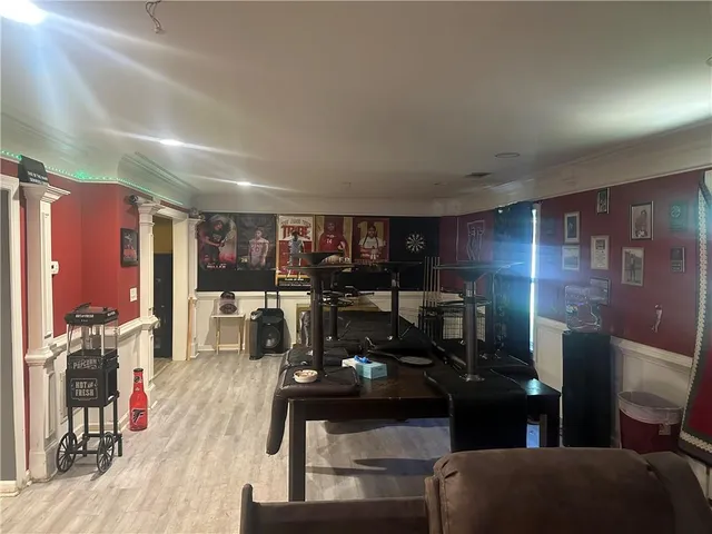 a view of a living room and dining room