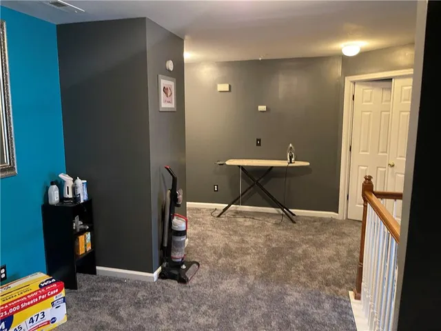 a room with furniture and a window