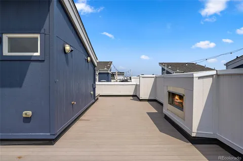 a view of a terrace with wooden floor