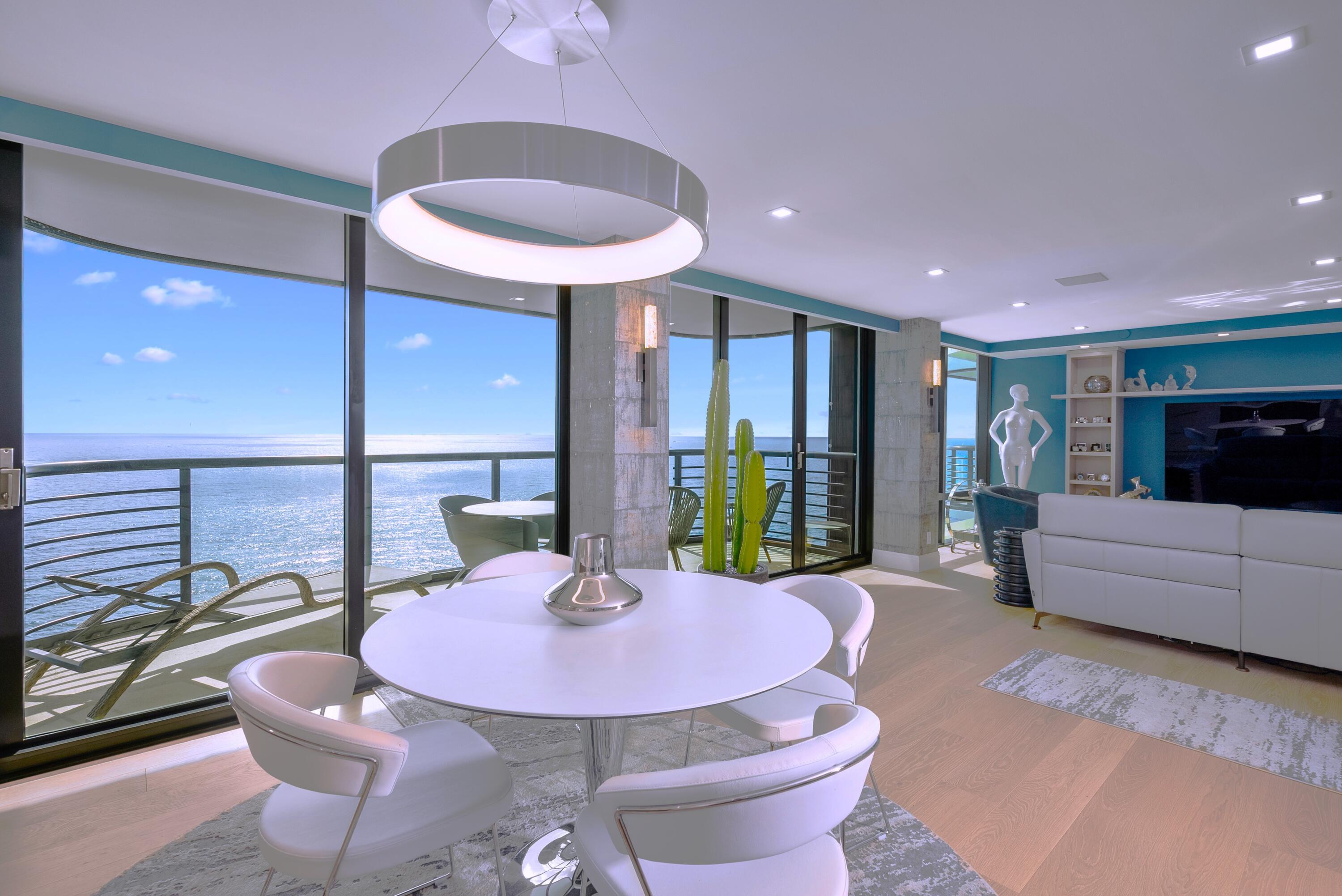 a living room with furniture a window and a table