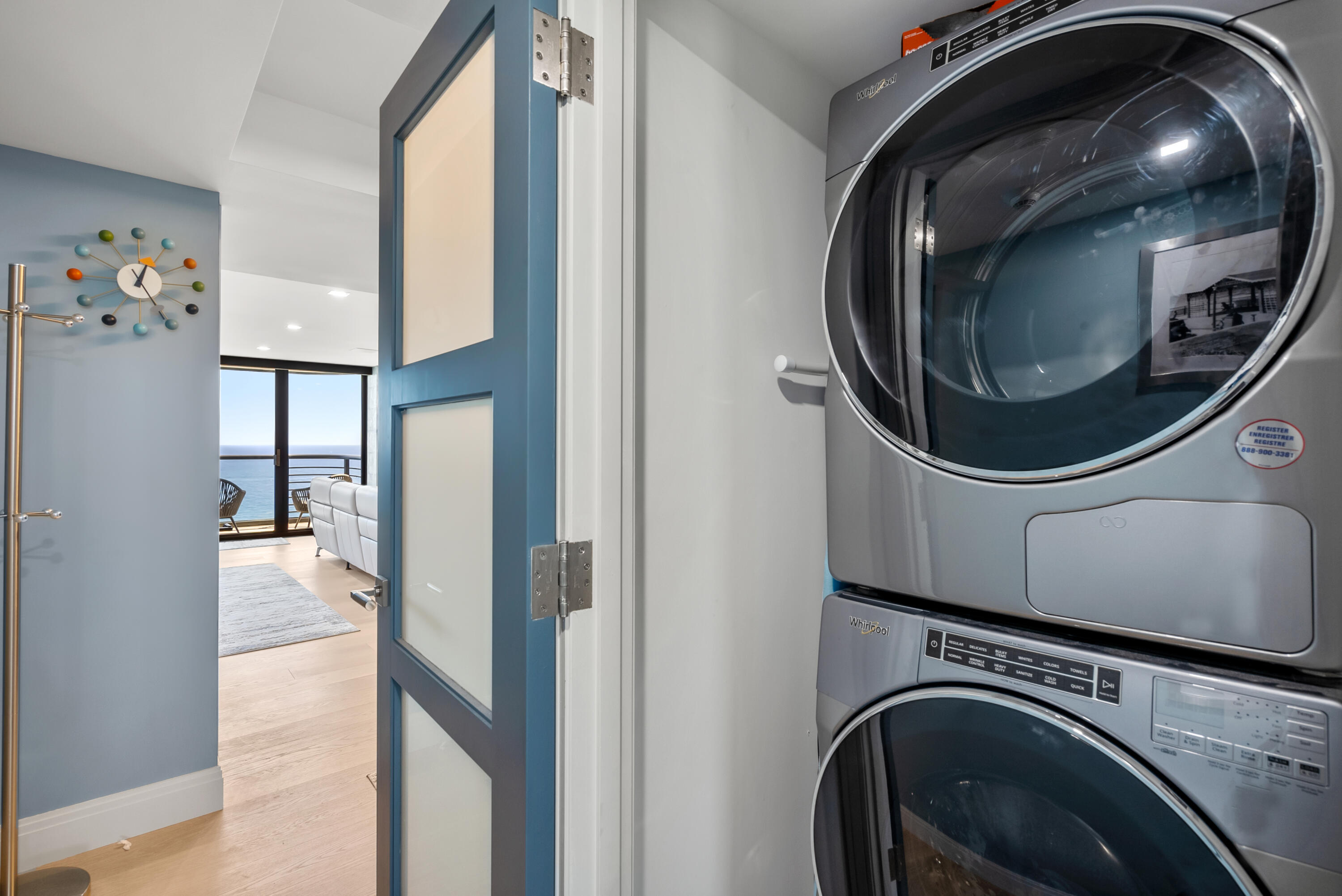250 South Ocean Boulevard, Unit PH F Boca Raton, FL 33432 - Photo 20 of 30 a utility room with dryer and washer