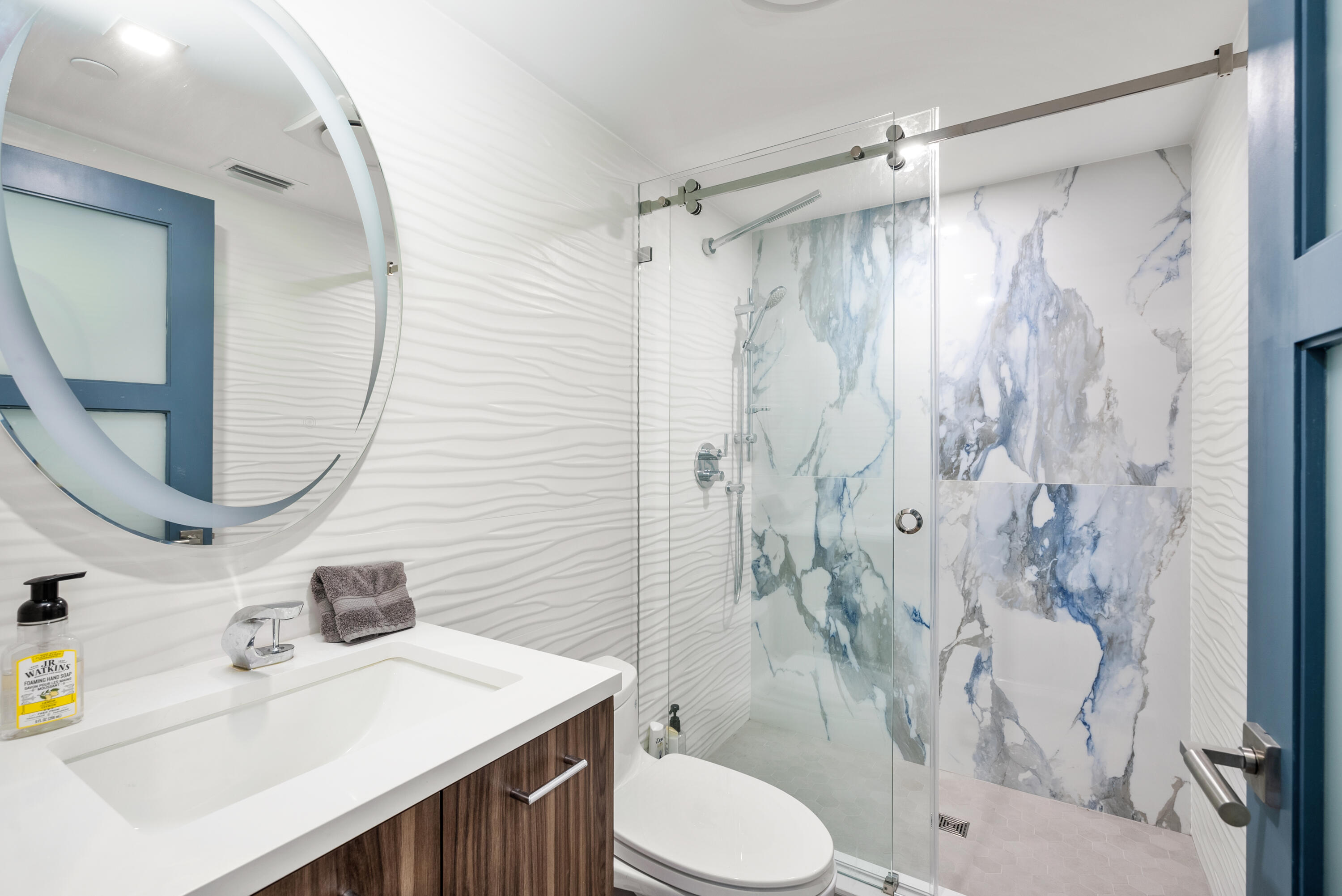 250 South Ocean Boulevard, Unit PH F Boca Raton, FL 33432 - Photo 24 of 30 a bathroom with a sink toilet tub and shower