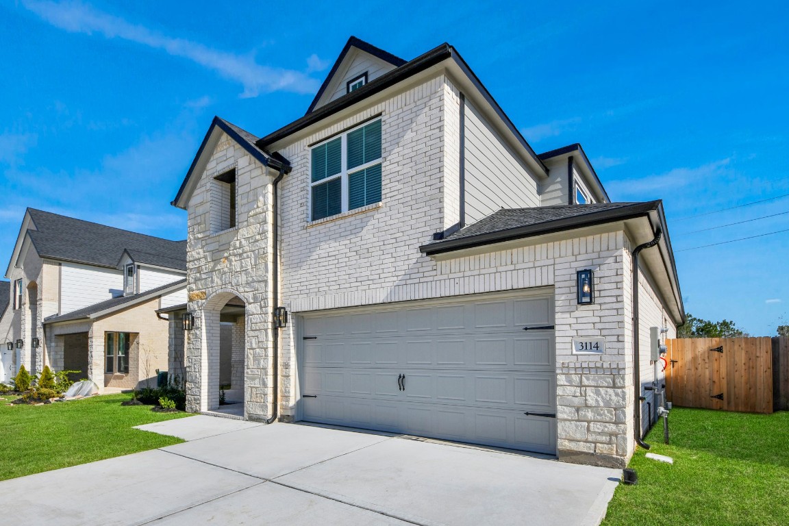 3114 North Spring Drive Spring, TX 77373 - Photo 2 of 45 a view of a house with a yard