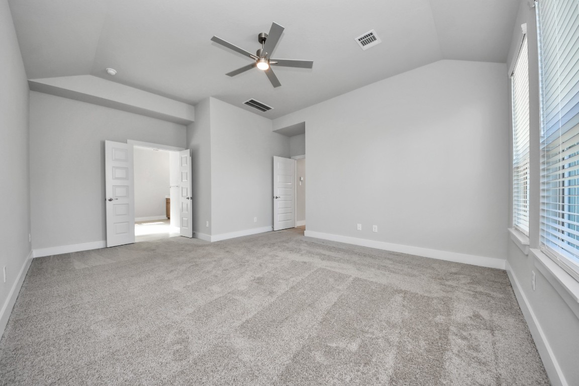 3114 North Spring Drive Spring, TX 77373 - Photo 21 of 45 a view of an empty room with a window