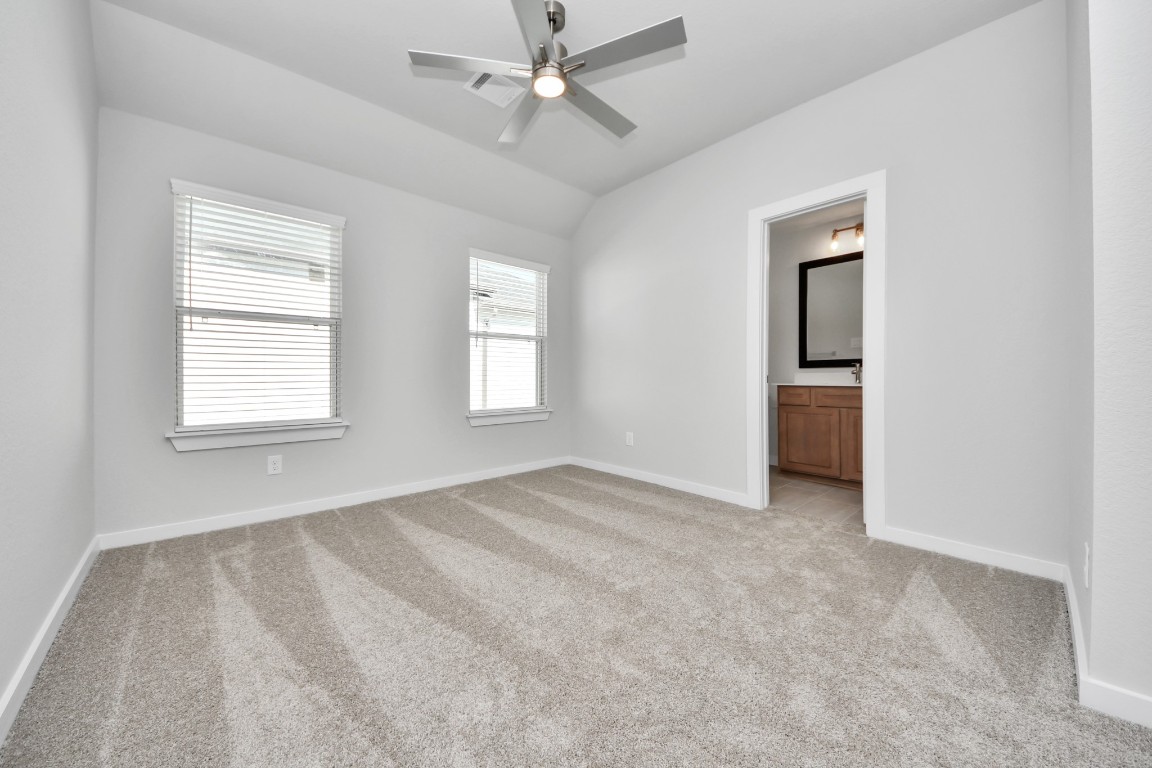 3114 North Spring Drive Spring, TX 77373 - Photo 28 of 45 a view of an empty room with a window
