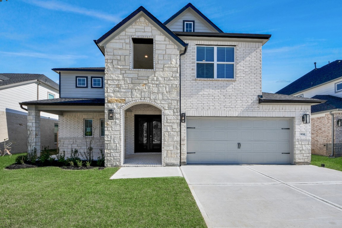 3114 North Spring Drive Spring, TX 77373 - Photo 3 of 45 a view of a yard in front of house