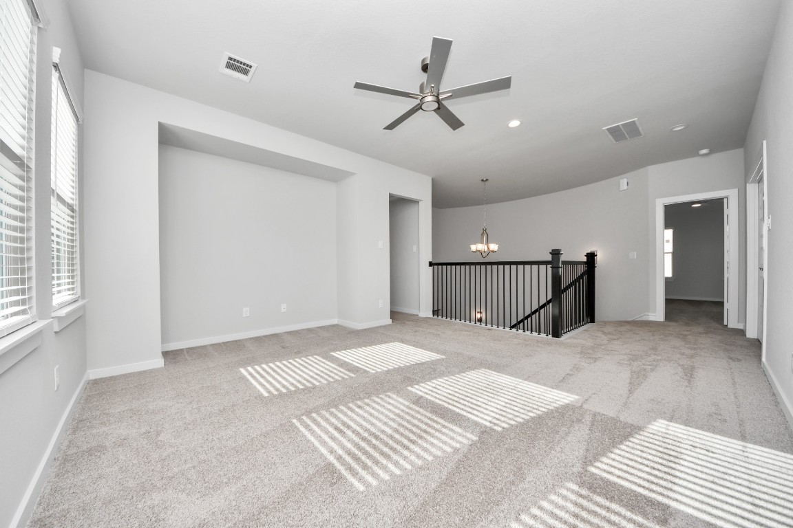 3114 North Spring Drive Spring, TX 77373 - Photo 33 of 45 a view of a livingroom with a ceiling fan and window