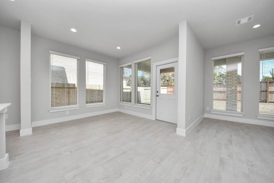 3114 North Spring Drive Spring, TX 77373 - Photo 9 of 45 a view of an empty room with a window
