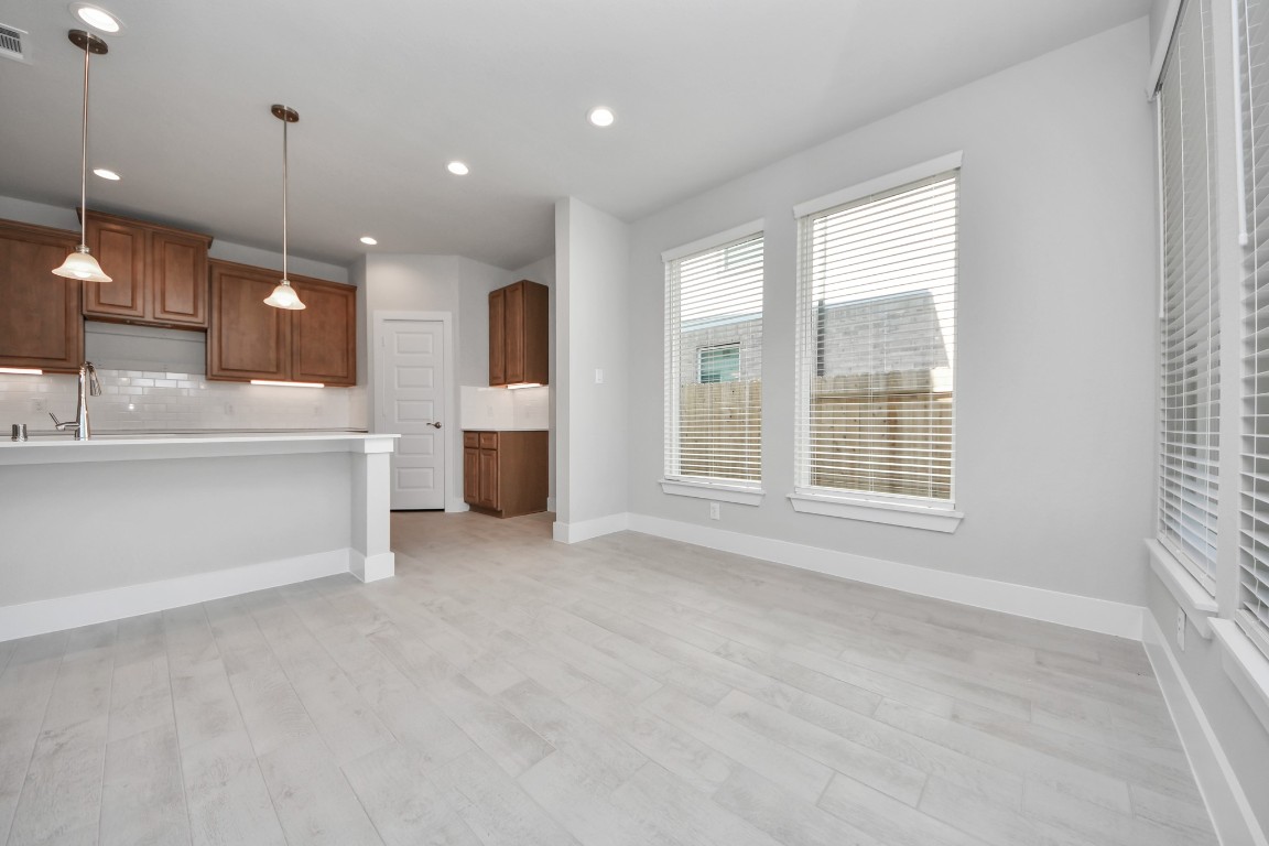 3114 North Spring Drive Spring, TX 77373 - Photo 10 of 45 a view of a kitchen with a sink and a window