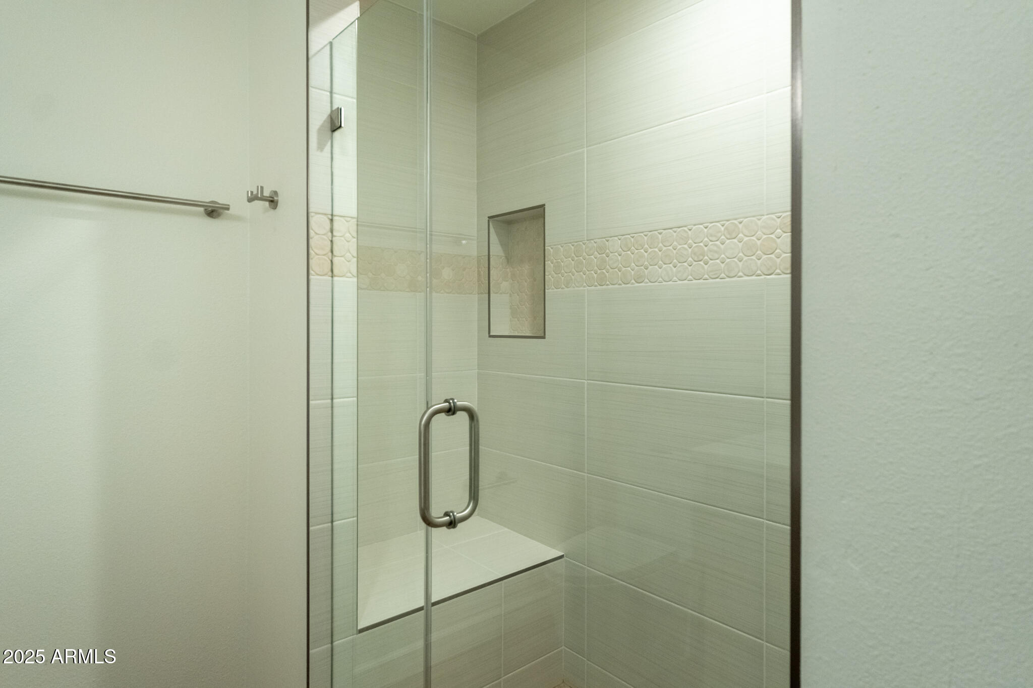 10115 East Mountain View Road, Unit 1089 Scottsdale, AZ 85258 - Photo 14 of 28 a bathroom with a glass shower door