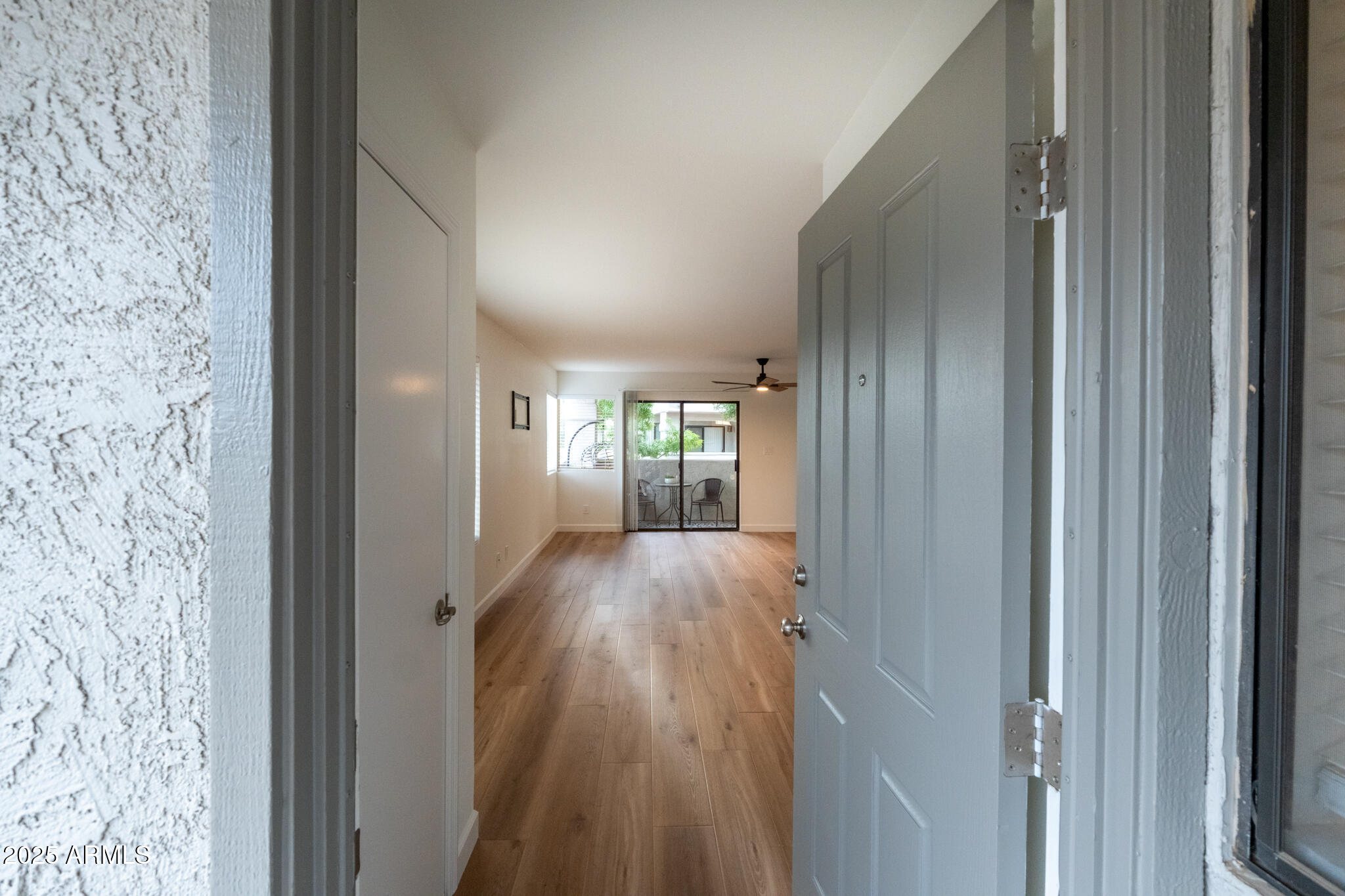 10115 East Mountain View Road, Unit 1089 Scottsdale, AZ 85258 - Photo 4 of 28 a view of gallery with wooden floor