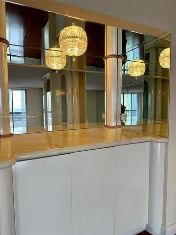 a view of a livingroom with wooden floors and wooden floor