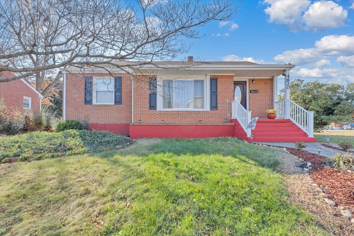 4820 Rutgers Street Northwest Roanoke, VA 24012 - Photo 1 of 41 a view of a house with a yard