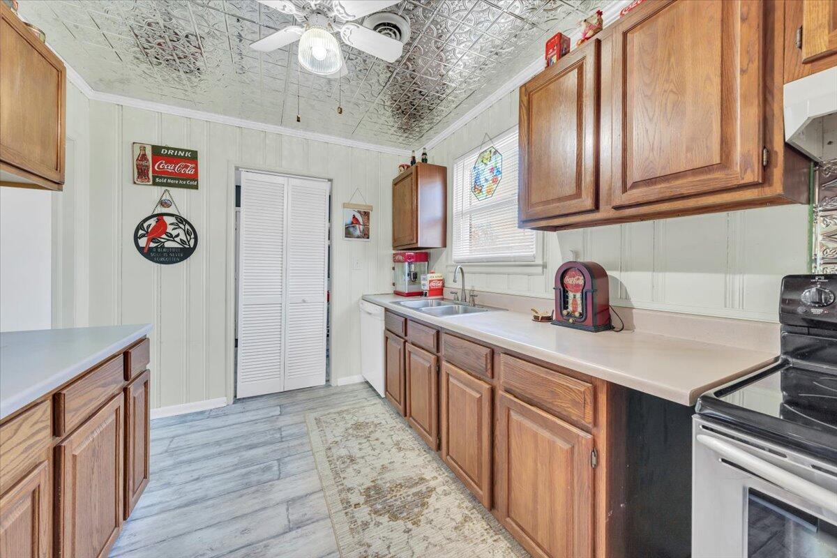 4820 Rutgers Street Northwest Roanoke, VA 24012 - Photo 12 of 41 a kitchen with stainless steel appliances granite countertop a sink and cabinets