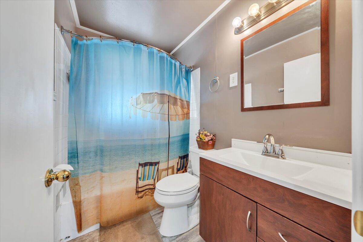 4820 Rutgers Street Northwest Roanoke, VA 24012 - Photo 24 of 41 a bathroom with a sink a toilet and shower