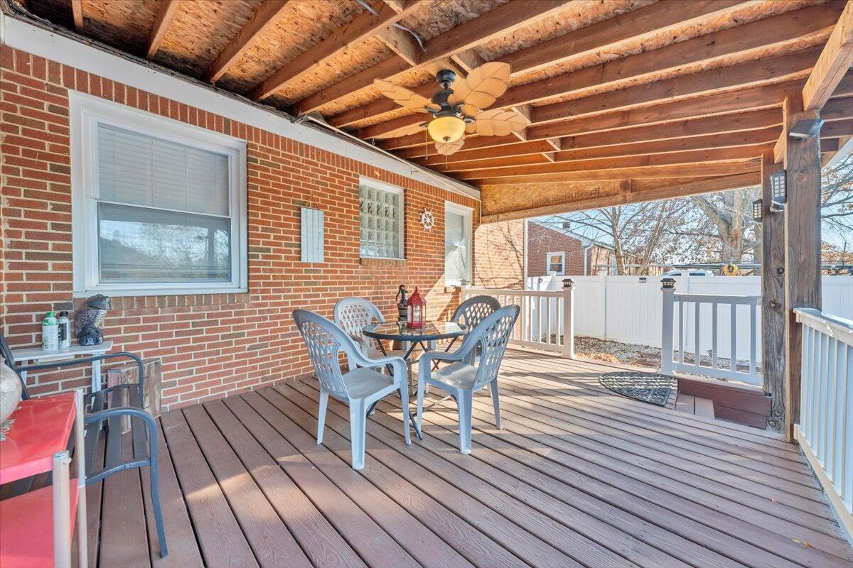 4820 Rutgers Street Northwest Roanoke, VA 24012 - Photo 27 of 41 a dining room with furniture and wooden floor