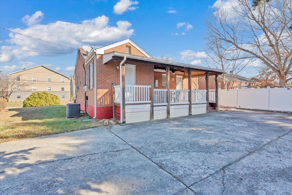 4820 Rutgers Street Northwest Roanoke, VA 24012 - Photo 32 of 41 a view of a house with a yard and garage