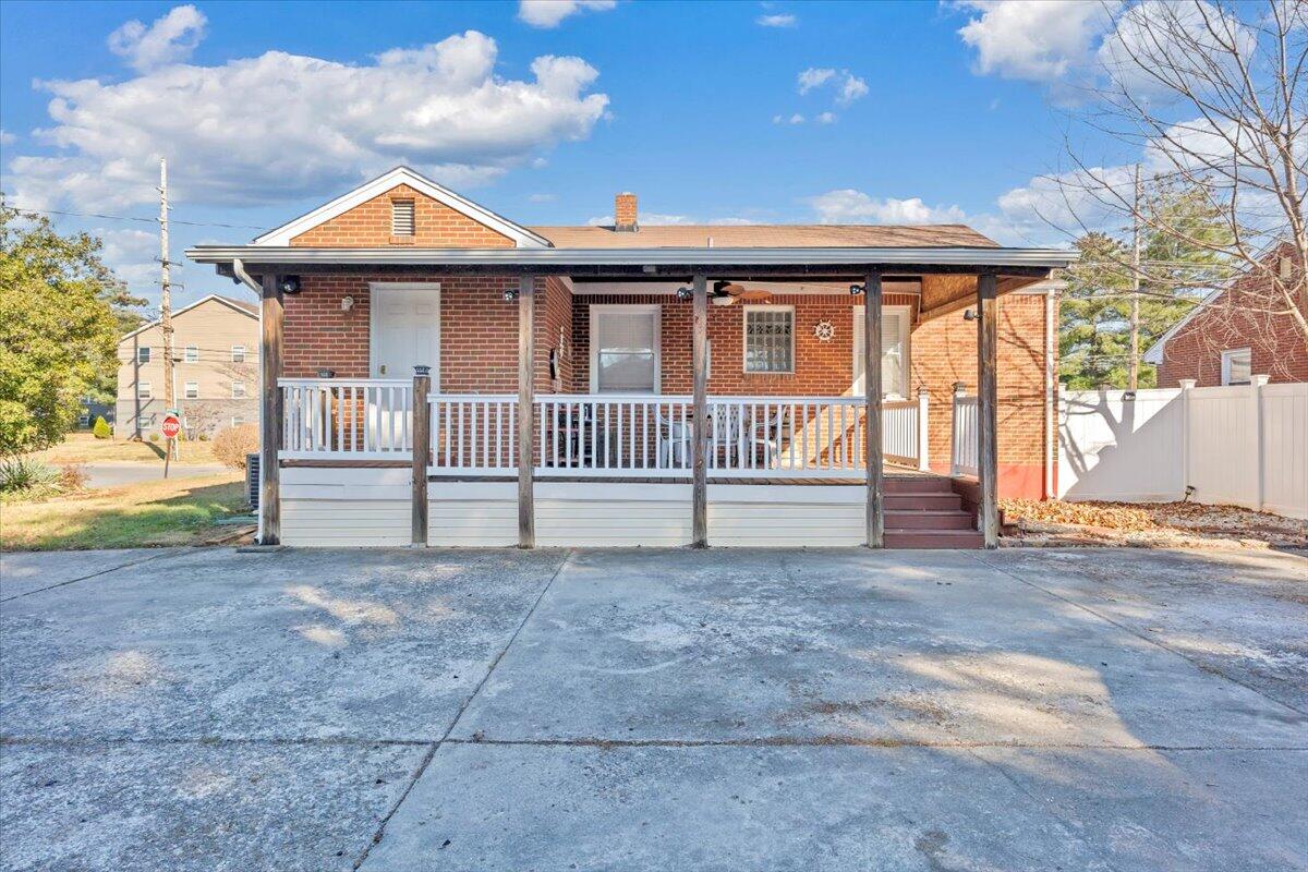 4820 Rutgers Street Northwest Roanoke, VA 24012 - Photo 34 of 41 a front view of a house with a garden