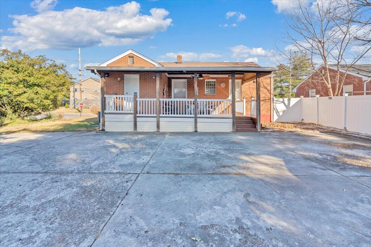 4820 Rutgers Street Northwest Roanoke, VA 24012 - Photo 35 of 41 a view of a house with a yard and balcony