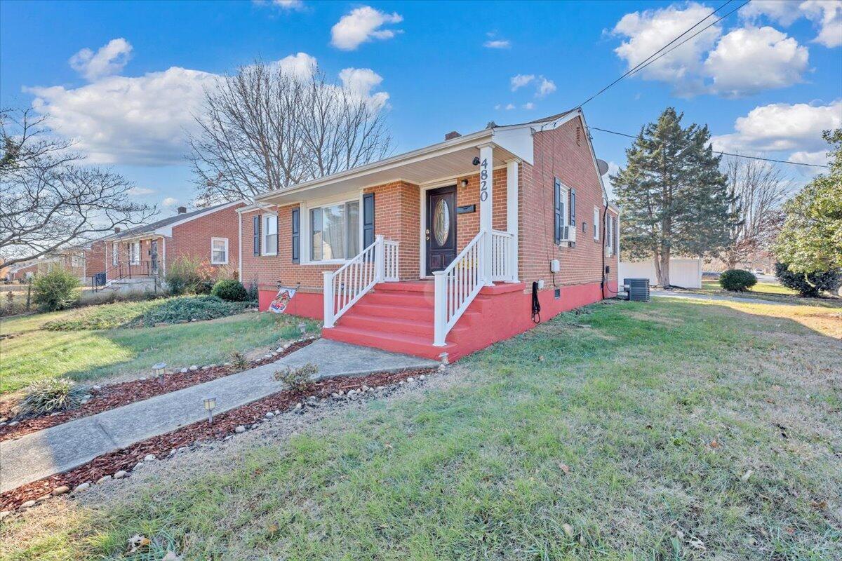 4820 Rutgers Street Northwest Roanoke, VA 24012 - Photo 41 of 41 a view of a house with backyard and sitting area