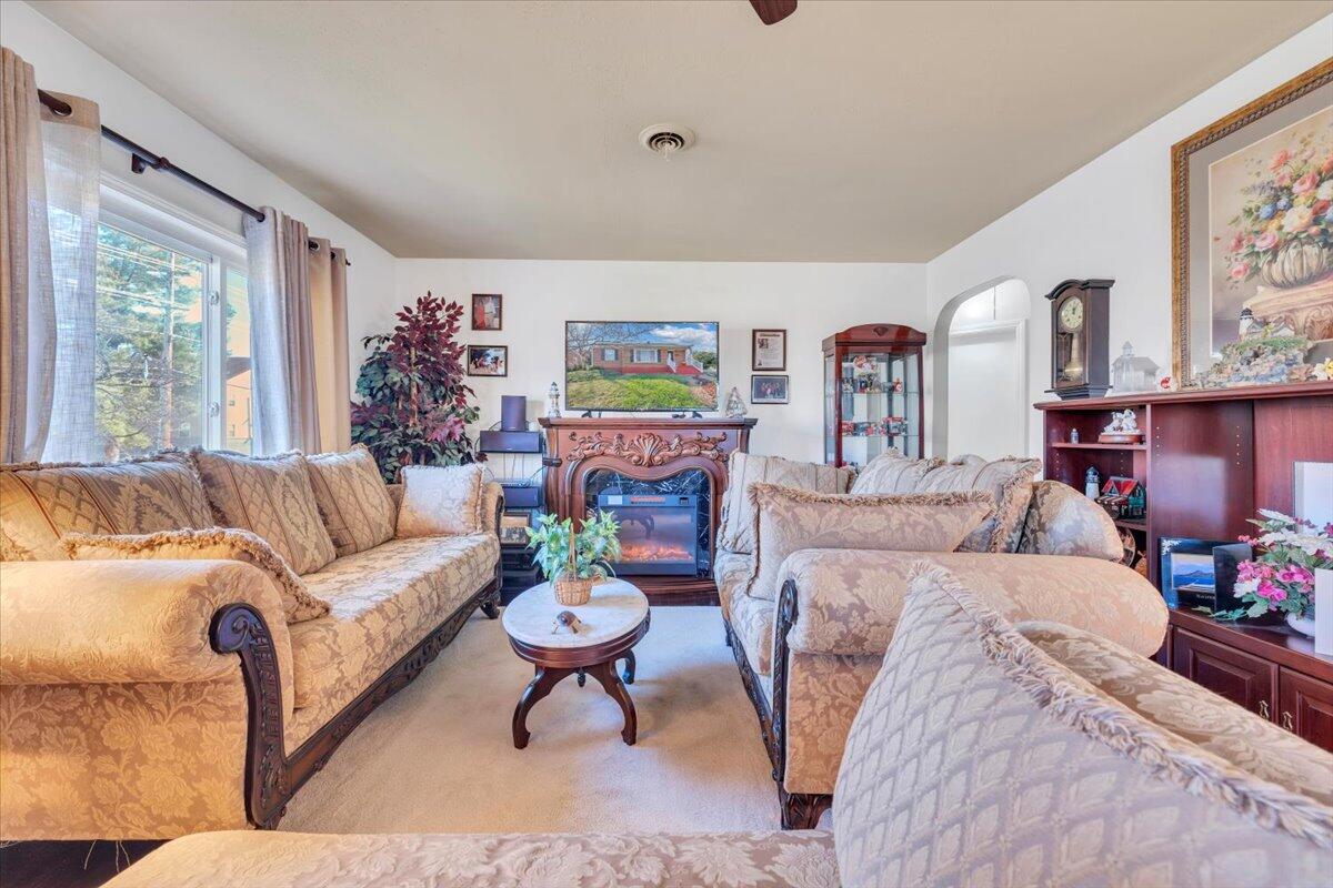 4820 Rutgers Street Northwest Roanoke, VA 24012 - Photo 6 of 41 a living room with furniture and a rug
