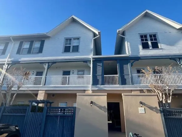 a front view of a house with balcony