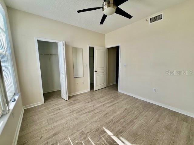 720 Celebration Avenue, Unit 235 Celebration, FL 34747 - Photo 11 of 16 a view of empty room with wooden floor